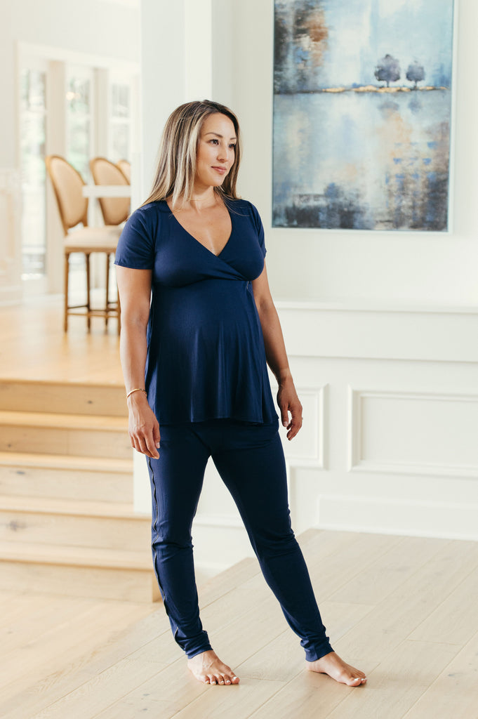 maternity loungewear pajamas set that includes a short-sleeve top with a soft cotton built-in easy to access cross over v-neck bra and jogger pants with pockets 