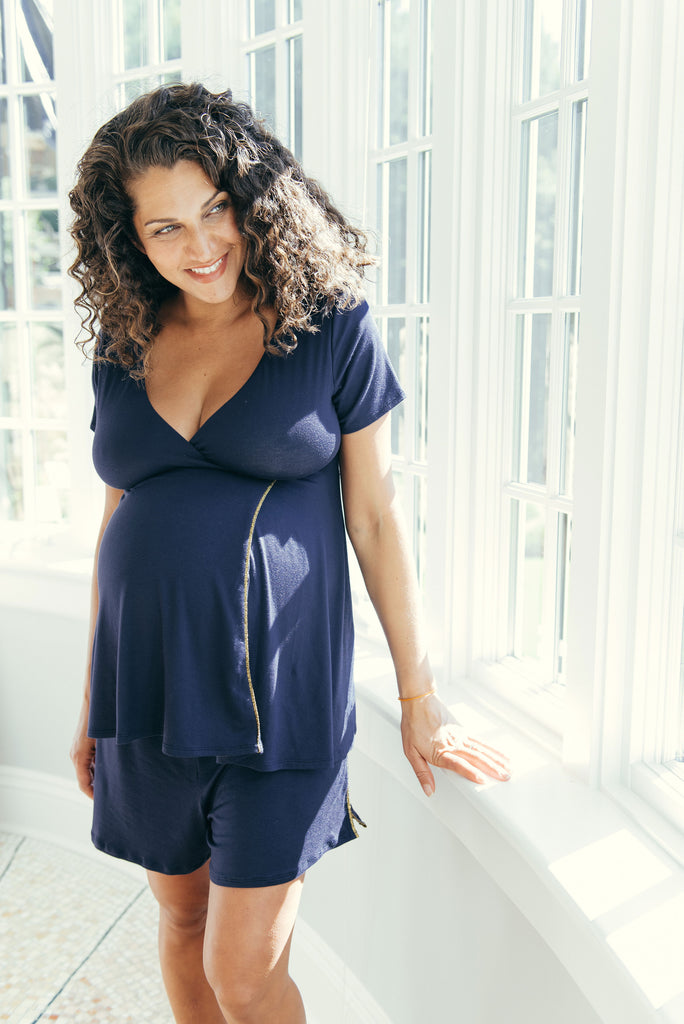 maternity loungewear pajamas set that includes a short-sleeve top with a soft cotton built-in easy to access cross over v-neck bra and shorts with pockets 